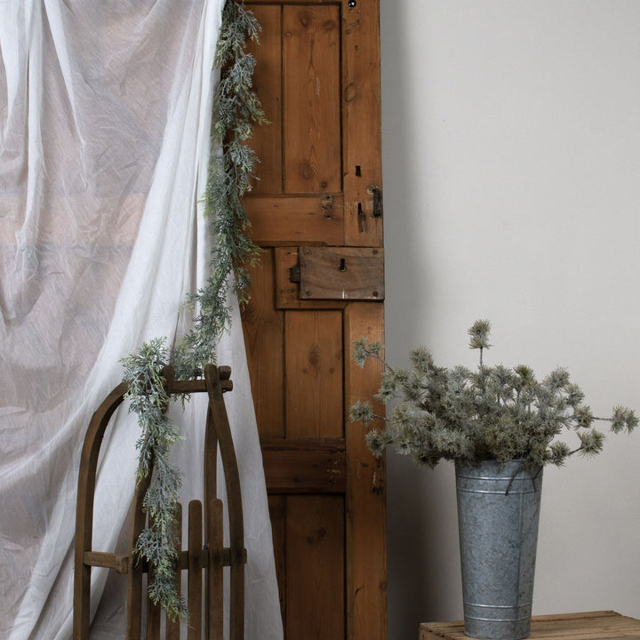 Frosted-Pine-Garland-With-Pinecones
