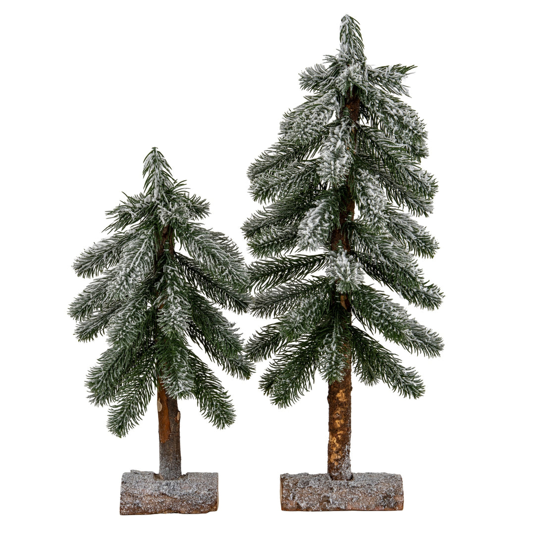 Small-Snowy-Pine-Tree-On-Wooden-Stand