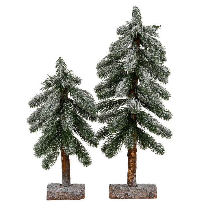 Small-Snowy-Pine-Tree-On-Wooden-Stand