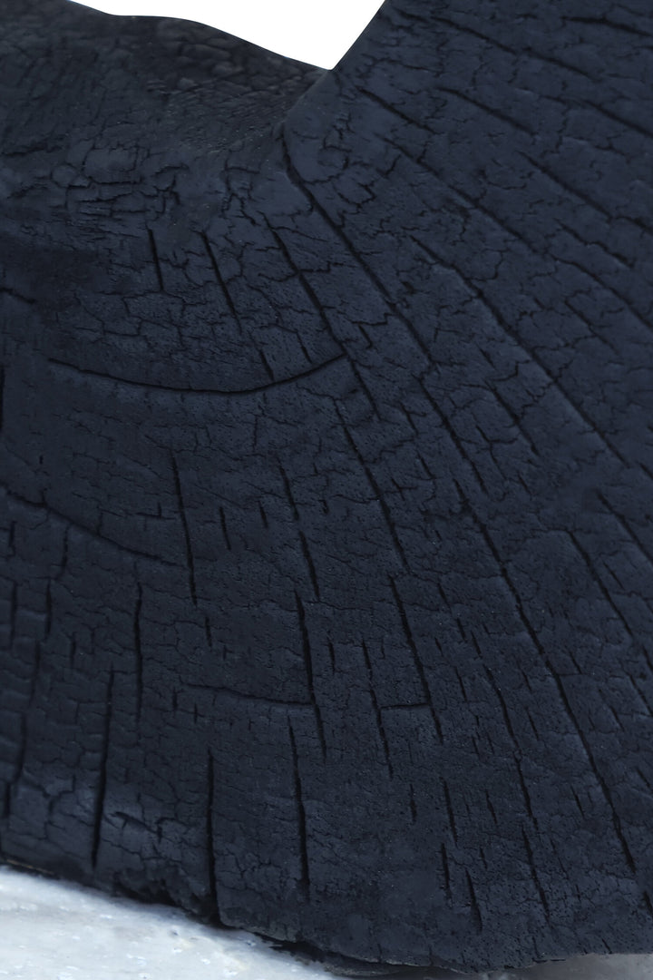 Sculpture Black with Mango Wood Travertine Base Corvessa