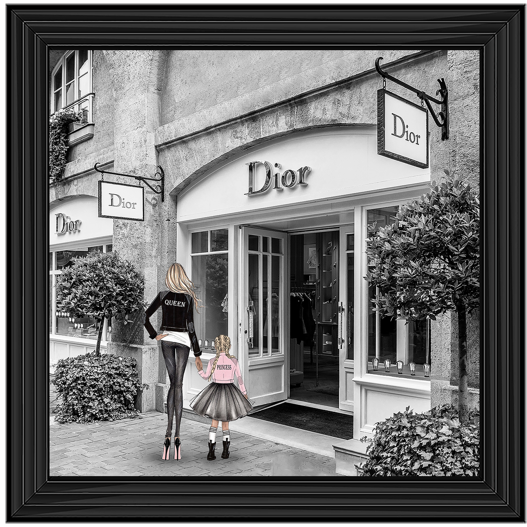 Mother and daughter in front of shop