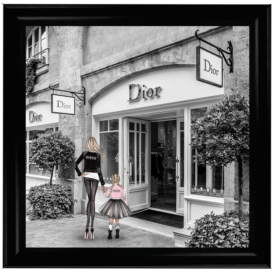 Mother and daughter in front of shop