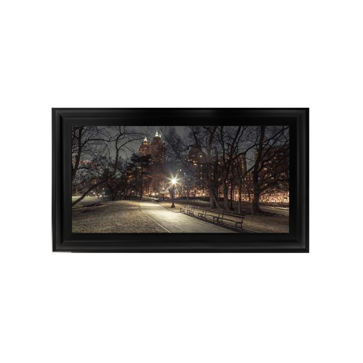 Path in cental park at night, winter, snow, New York. Assaf Frank