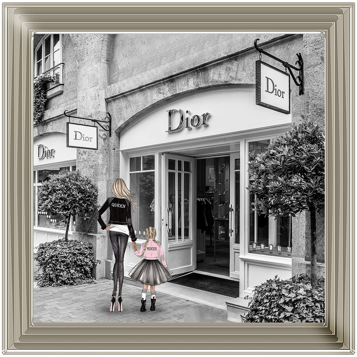 Mother and daughter in front of shop