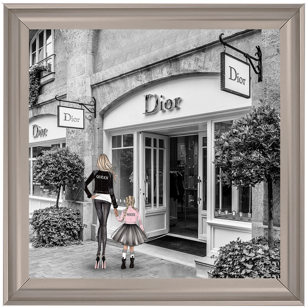 Mother and daughter in front of shop
