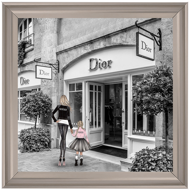 Mother and daughter in front of shop