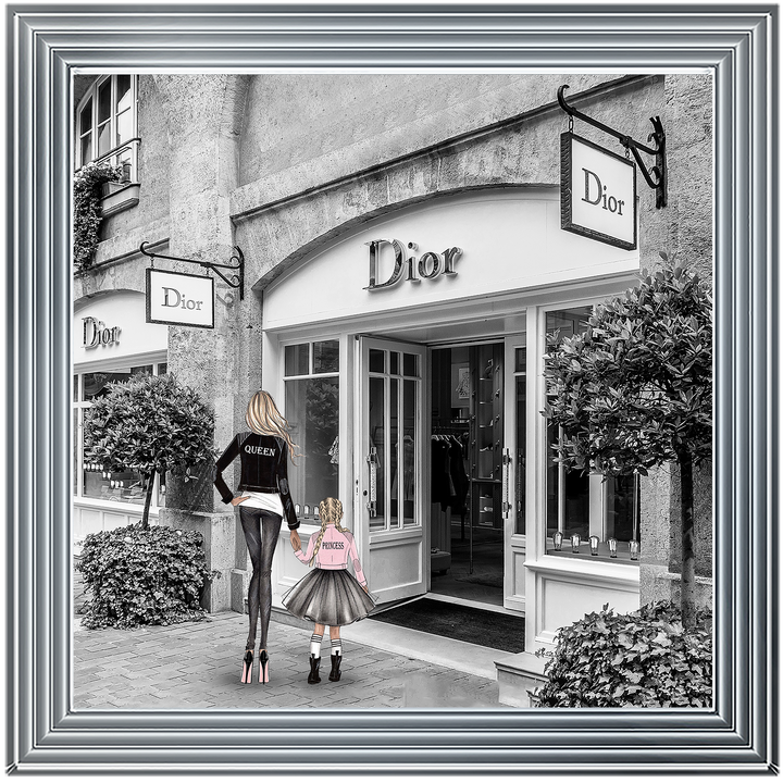 Mother and daughter in front of shop