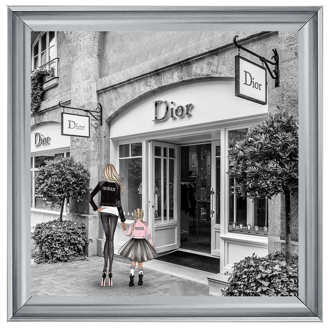 Mother and daughter in front of shop