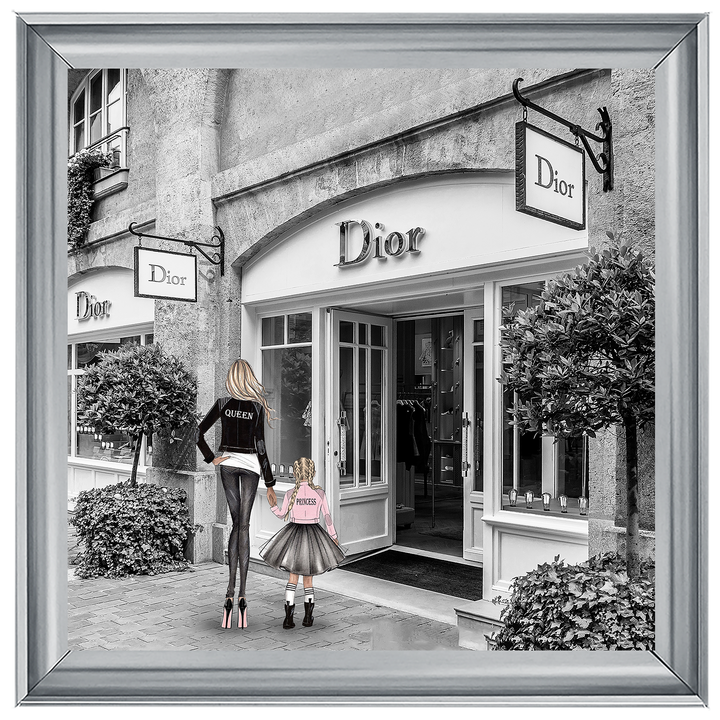 Mother and daughter in front of shop