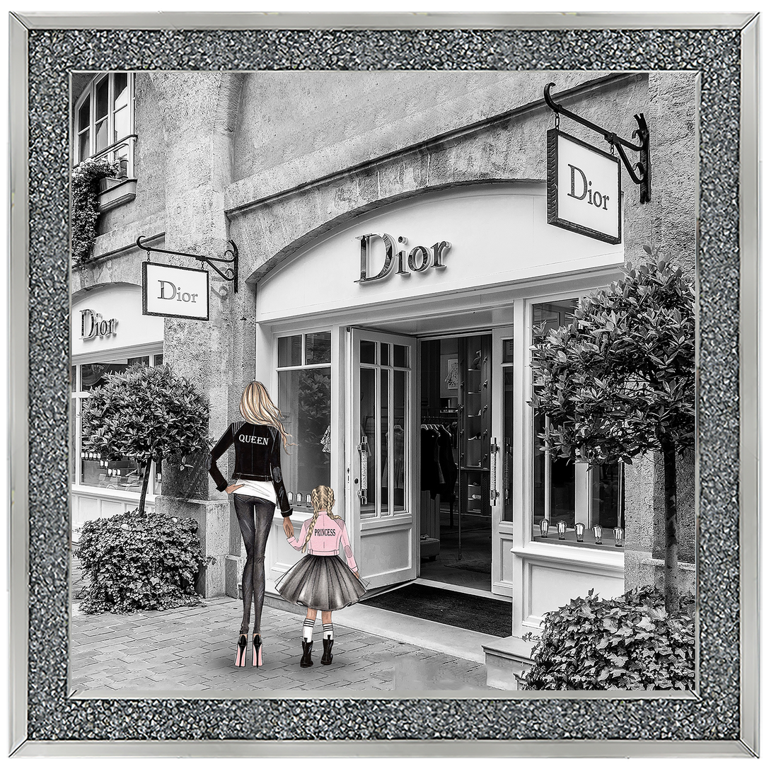 Mother and daughter in front of shop