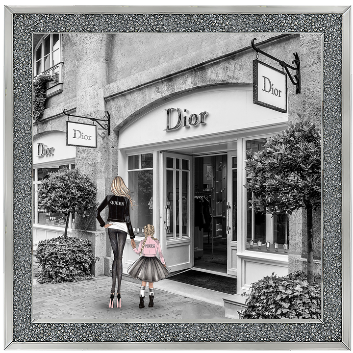 Mother and daughter in front of shop