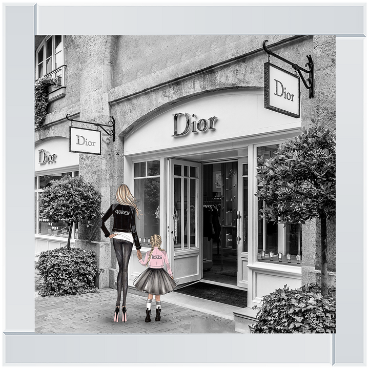 Mother and daughter in front of shop