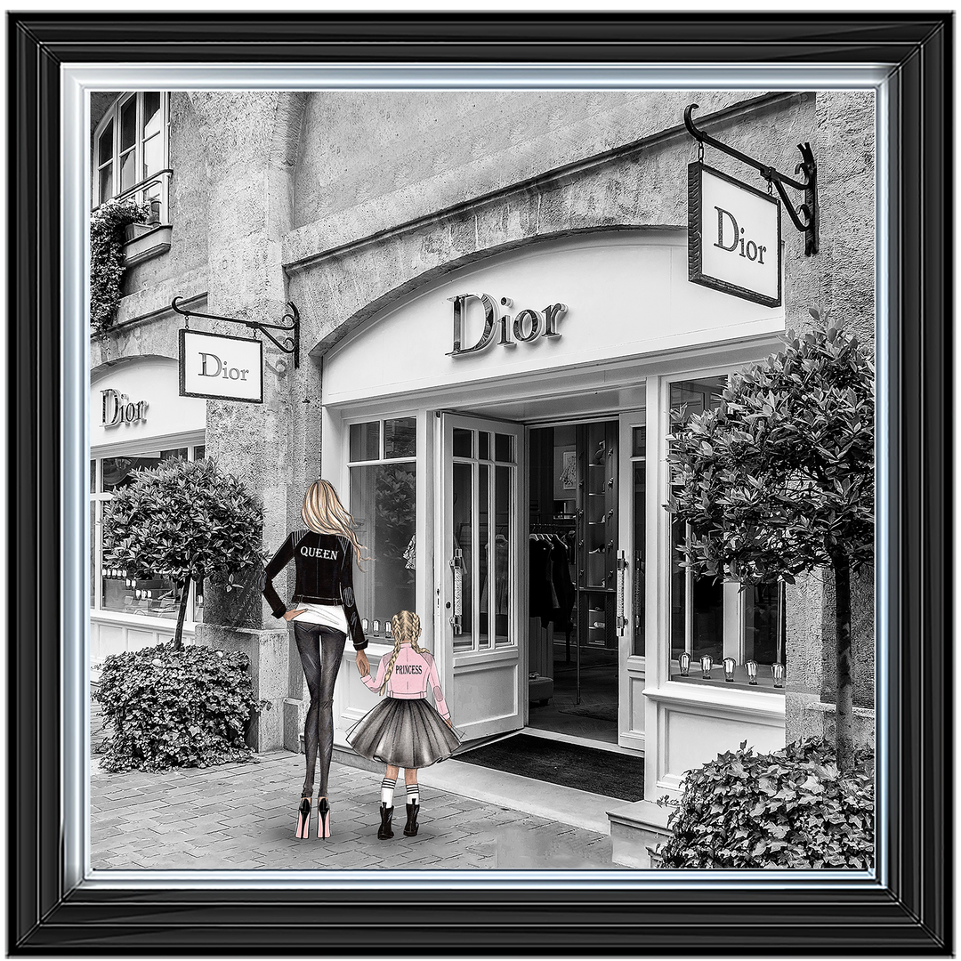 Mother and daughter in front of shop