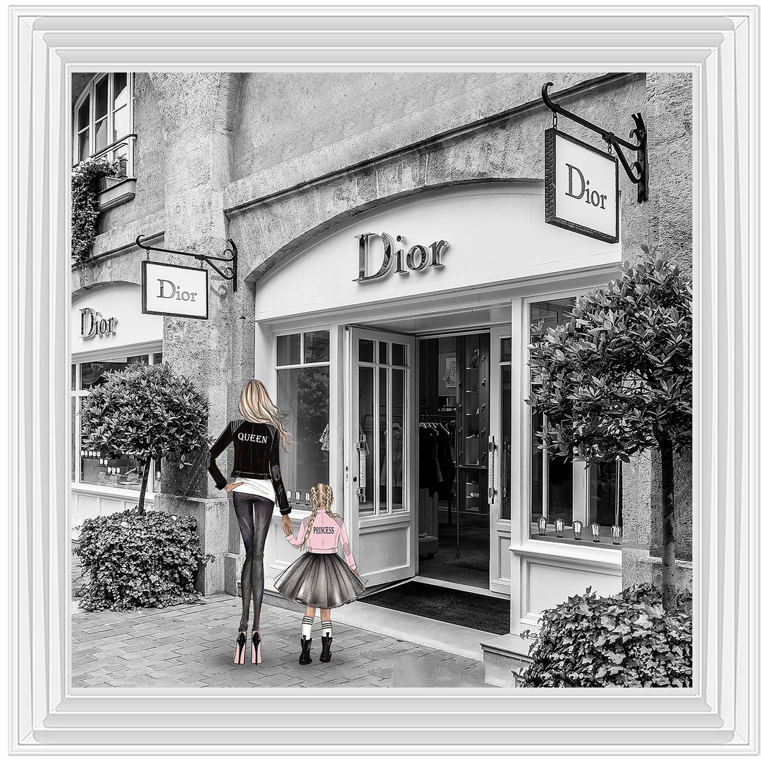 Mother and daughter in front of shop