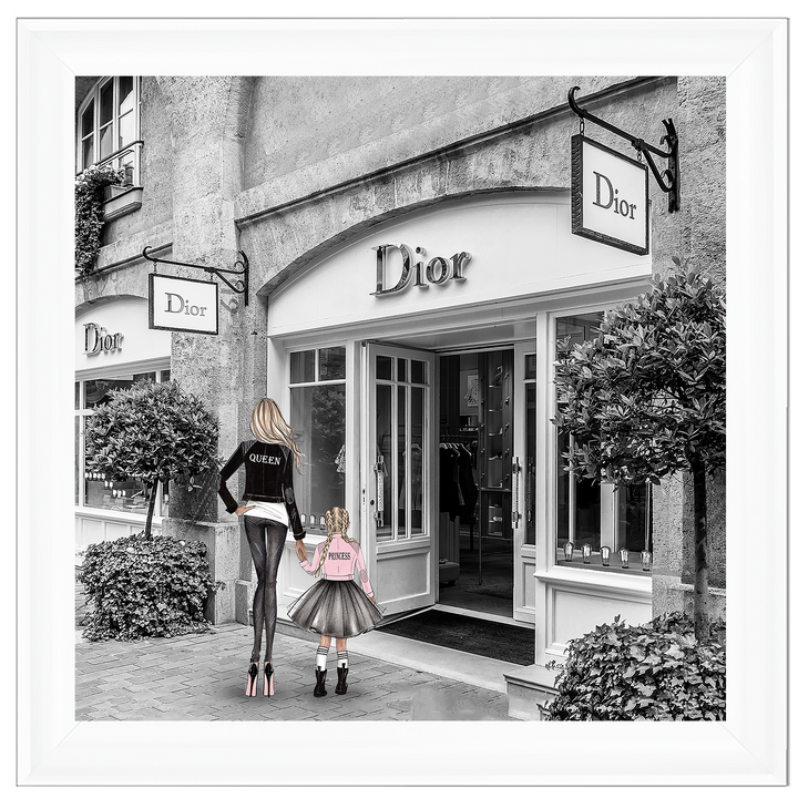 Mother and daughter in front of shop